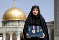 اهدای مدال به آستان قدس توسط بانوی قهرمان مازندرانی اهدای مدال به آستان قدس توسط بانوی قهرمان مازندرانی